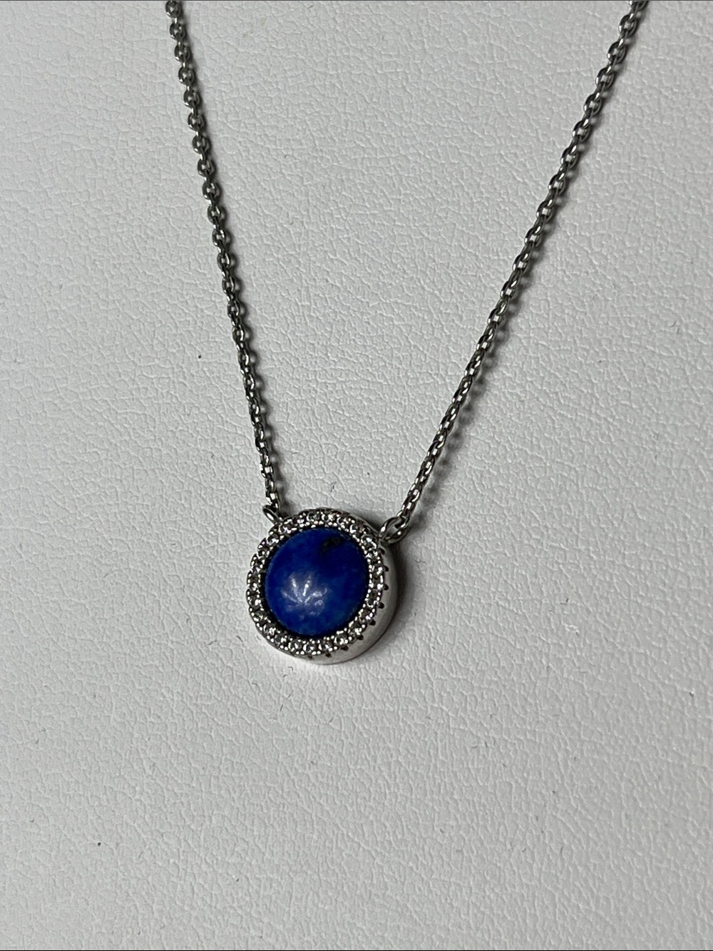Round Blue Stone Halo Pendant Necklace in Silver Tone